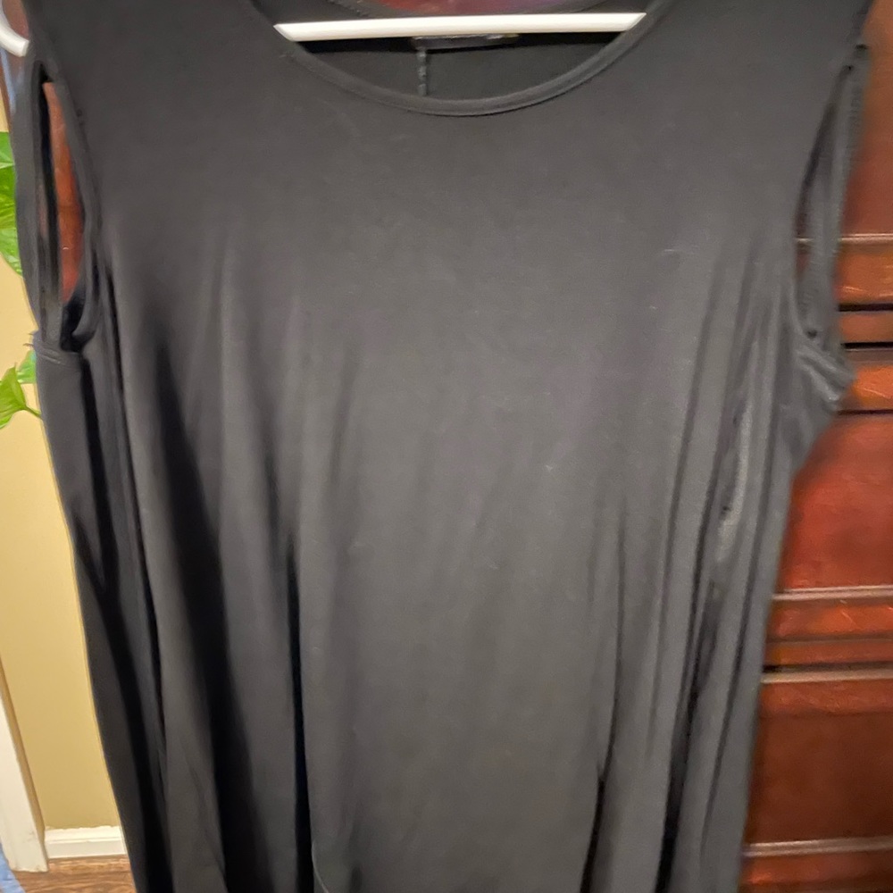 Black long sleeve top with criss cross cold shoulder